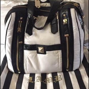 Really cute med sz LAMB bag w/ bag dust cover